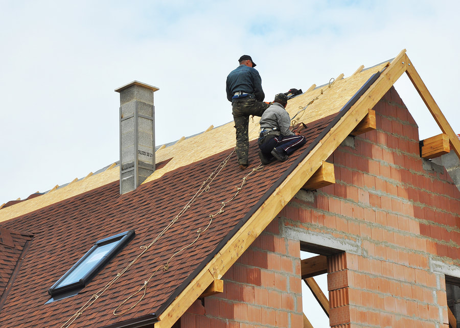 man installing the roof